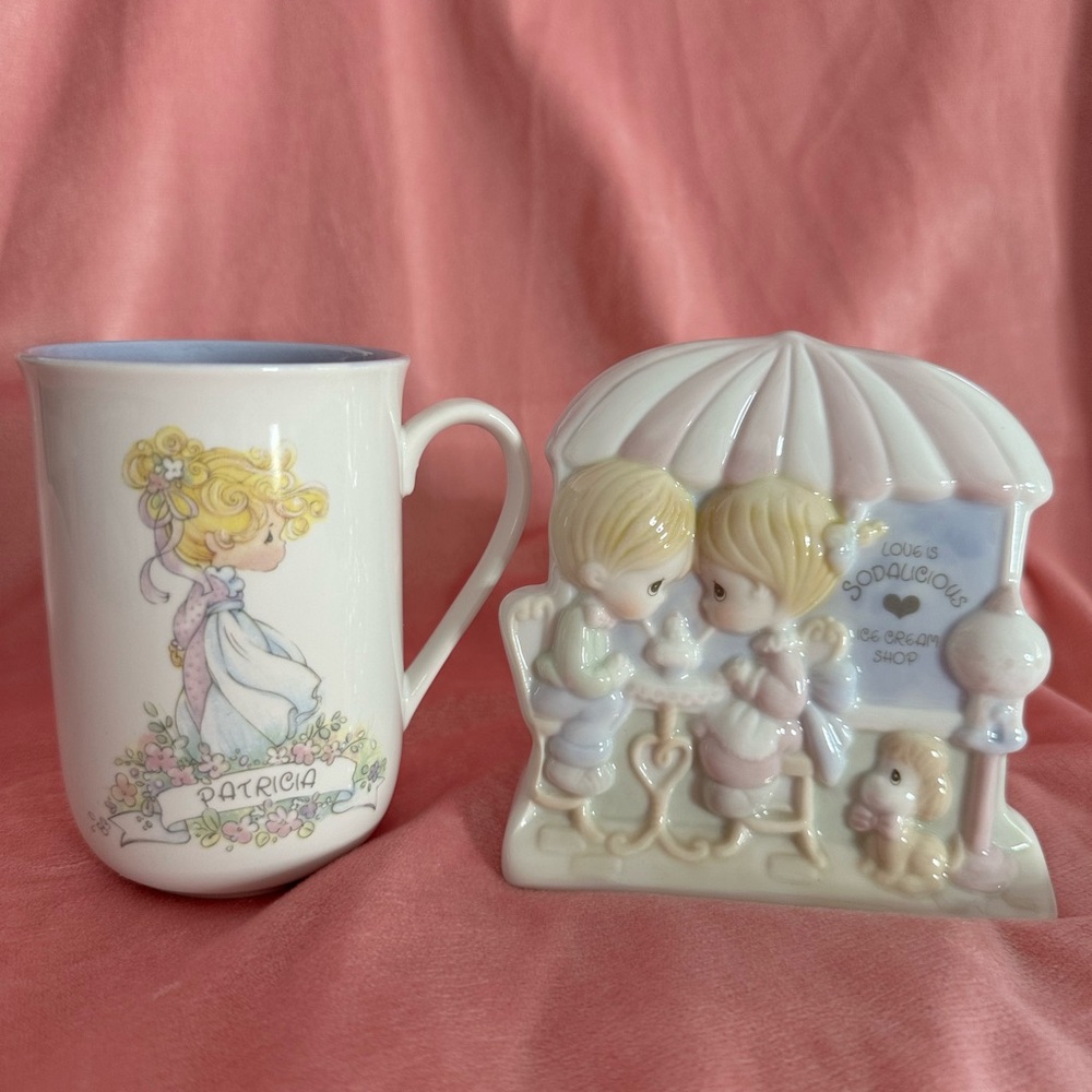 Vintage napkin holder and coffee cup precious moments.